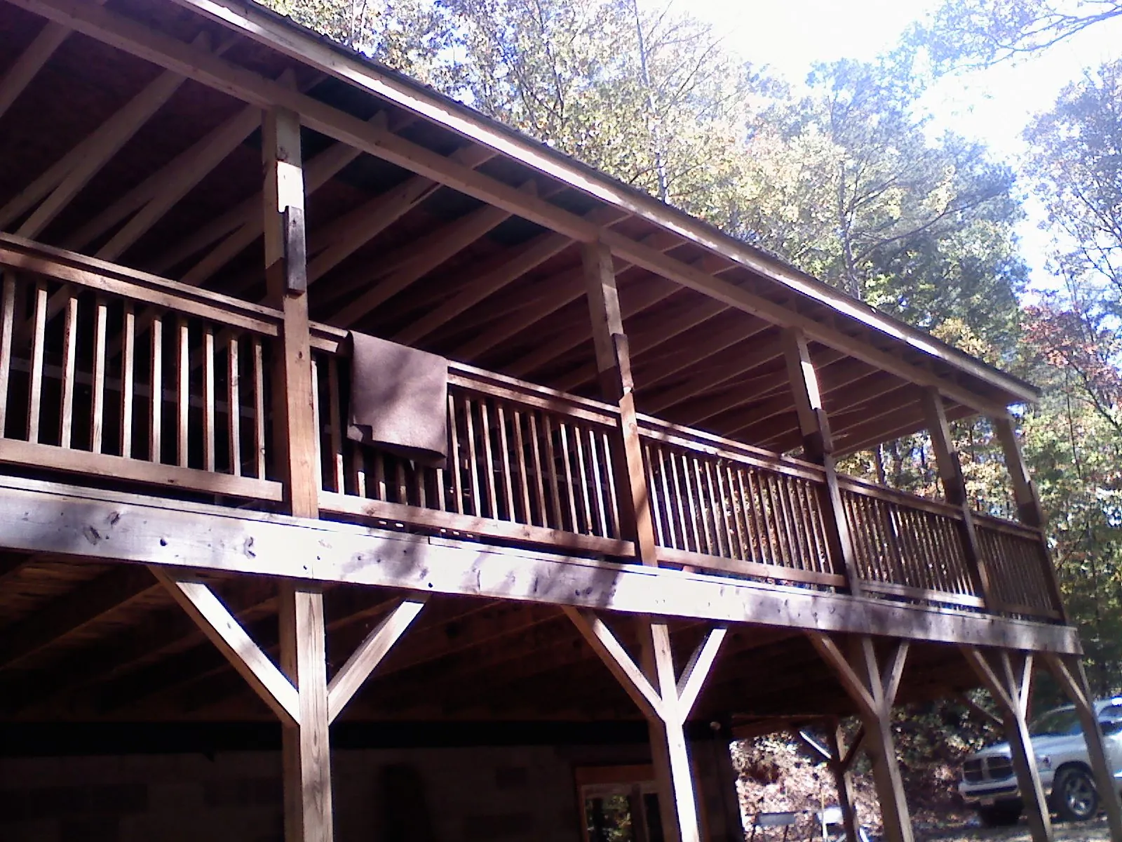 Timber framing under a new elevated porch and deck — Roof Leak Repair in Buna by Roofing Brothers